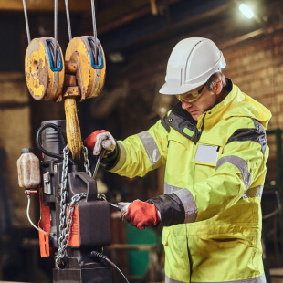 Worker with machinery